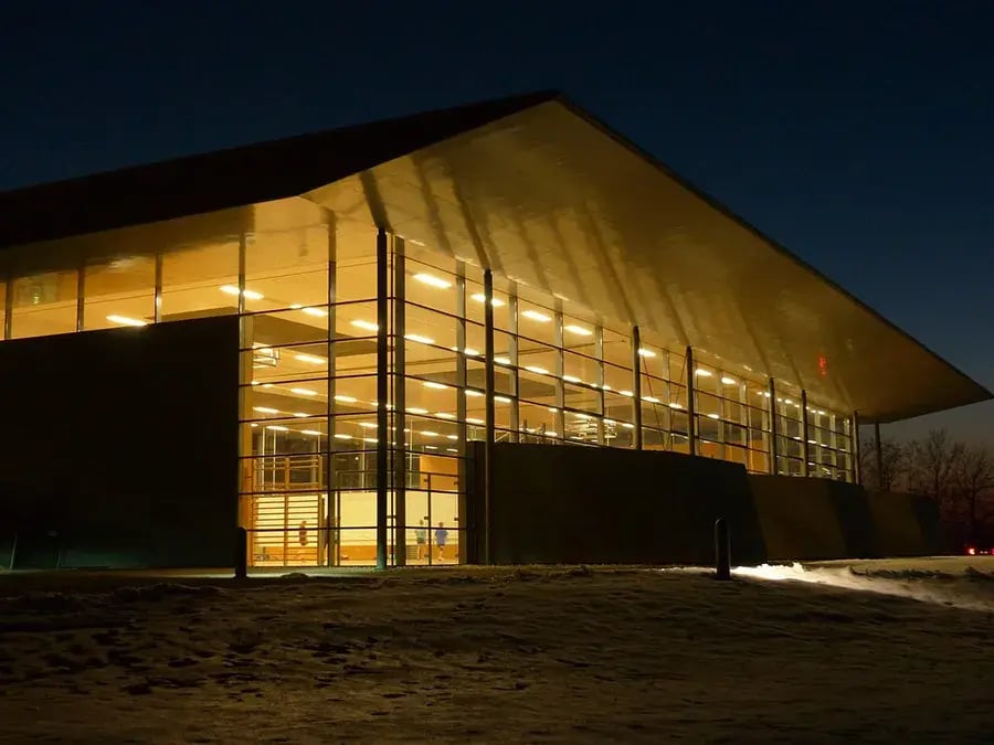 Brightly lit gymnasium at night