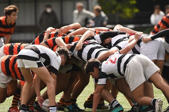 A group of people playing rugby union